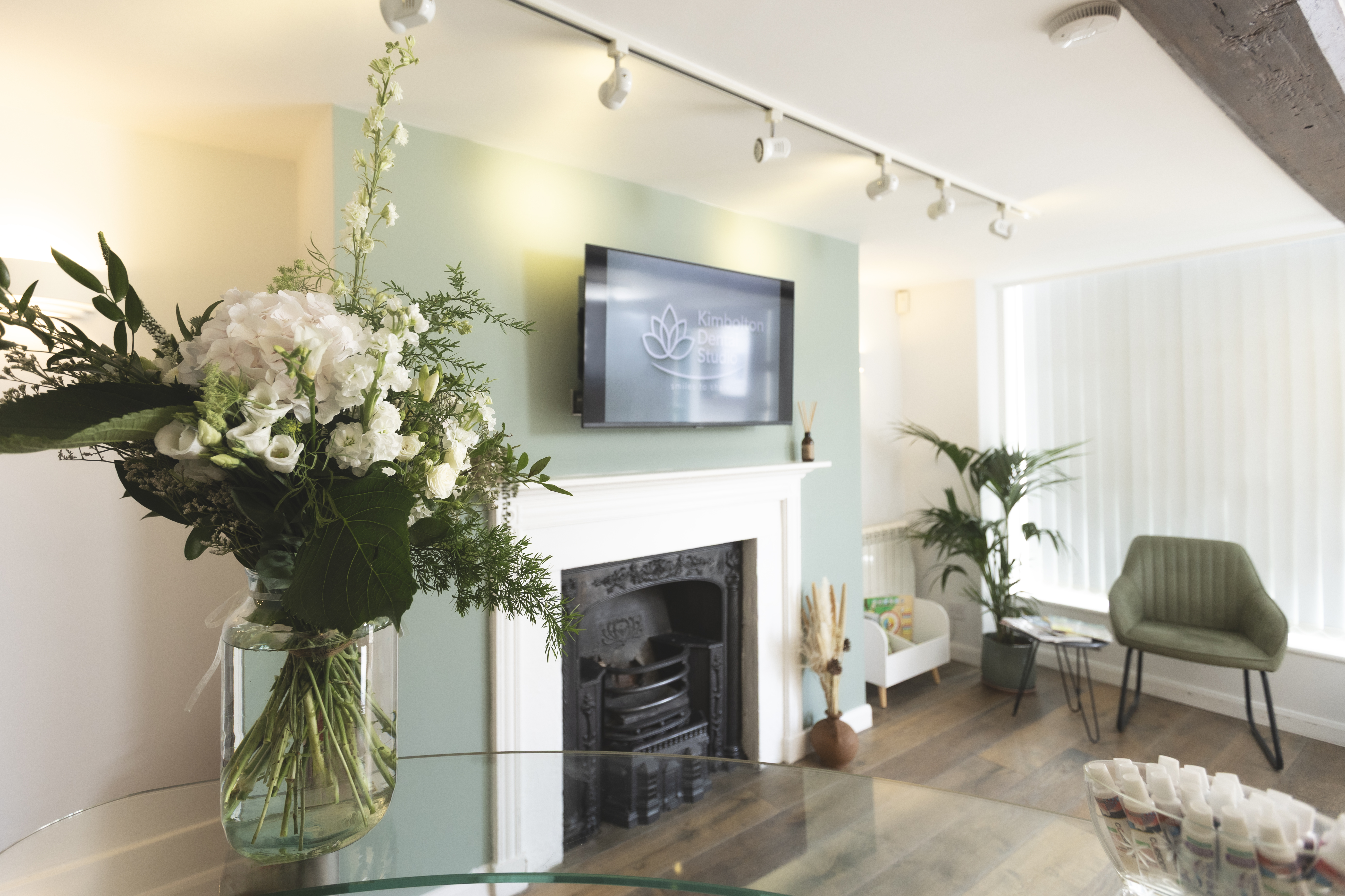 The bright and welcoming reception room at Kimbolton Dental Studio